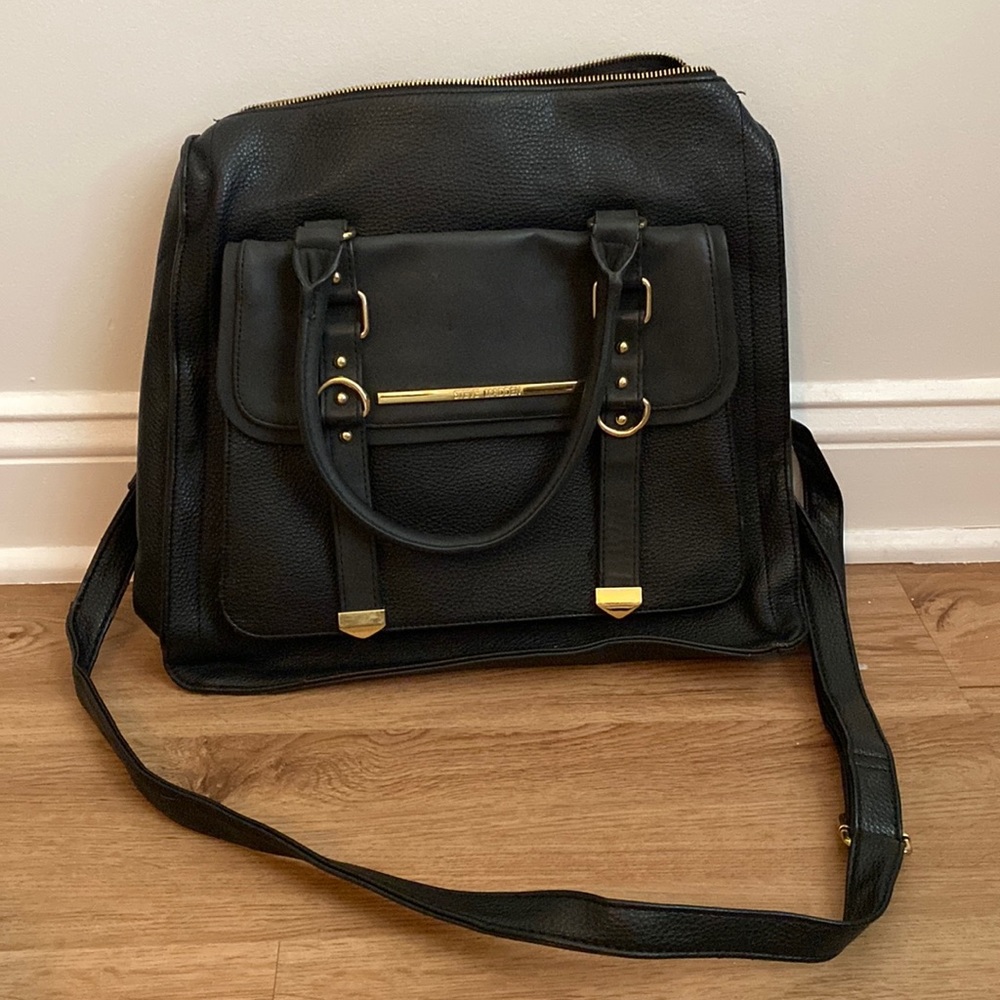 Steve Madden leather work back with gold accents